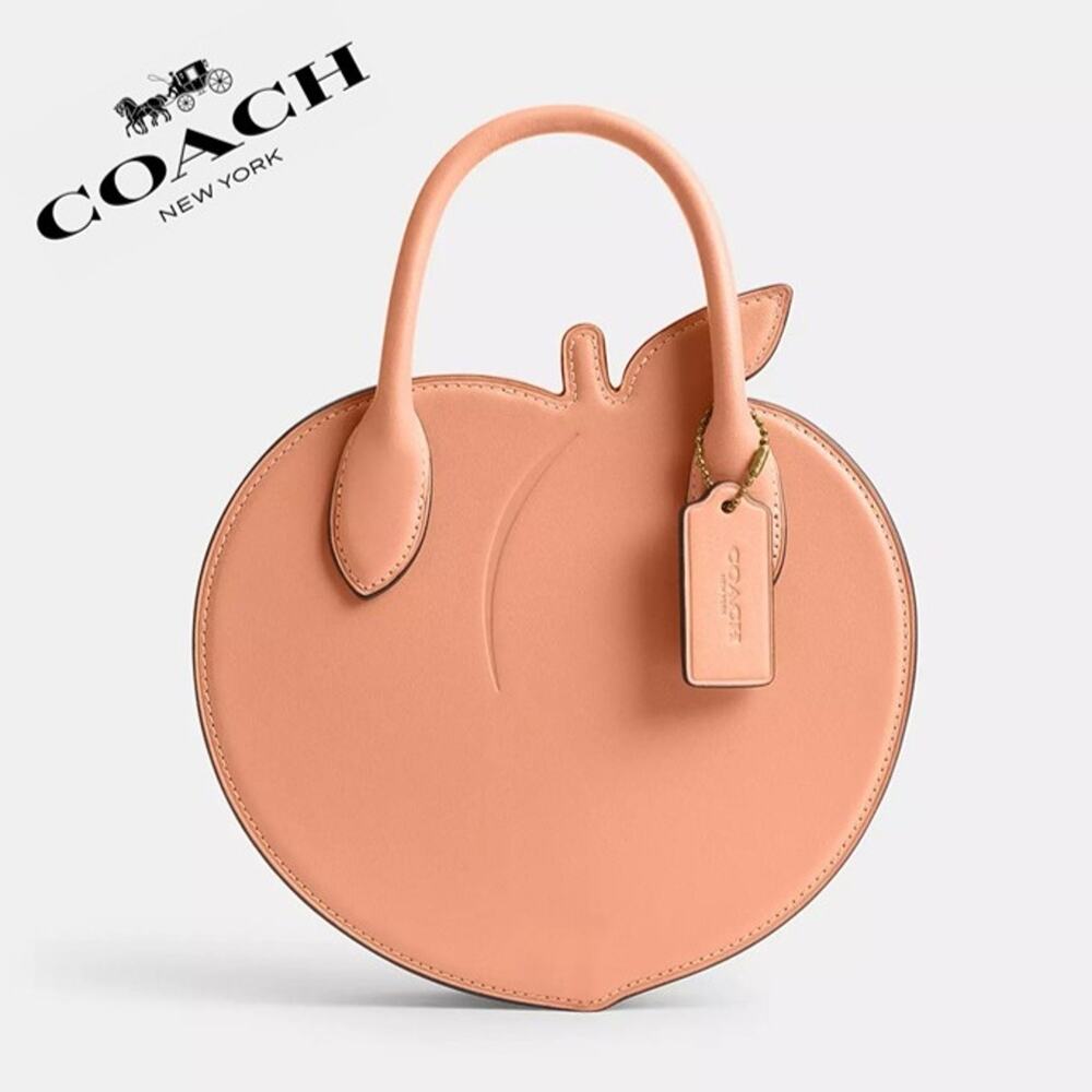 COACH Peach-Shaped Leather Top-Handle Bag in Blush Peach
